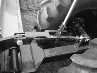Figure 34. Rotor Drive Hub Lubrication Points & Gearbox Oil Drain Location 2. Repack wheel bearings.