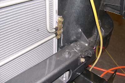 Strap steering wheel to prevent accidental movement. 7. Radiator a. Using two jack stands as shown support radiator as shown.