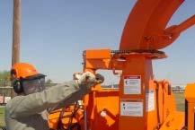 12 CHIPPER MACHINE OPERATION AIM DISCHARGE CHUTE 1 Carlton Chippers are equipped with a rotating discharge chute. To rotate the chute to the desired position 1.