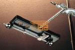 It is provided with a detachable rod which enables to clamp the apparatus on a stand or table. Includes 2 steel balls.