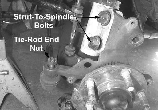 (Fox chassis shown) 15. Spray the outer tie-rod end taper stud with penetrating oil. 16. Remove the front swaybar end link. 17. Turn the spindle to its maximum toe-in position.
