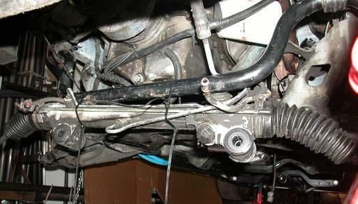 It is not necessary to disconnect any hoses from the steering rack. 37. Remove the four bolts at the rear of the K-member. 33.