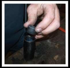 NOTE: Take care when removing the bushing from the