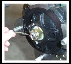 Be careful to support it properly so that it is secure, but so that the a-arms and shocks can drop to full extension.