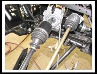 7. Pull the stock axles out of