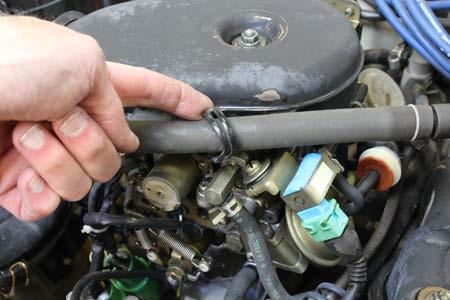 Step 1 Remove the air intake case nut using a