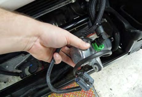 Use the supplied wires and crimp type butt connectors to extend the fog lamp harness. Cover the extension with the corrugated wire loom provided.