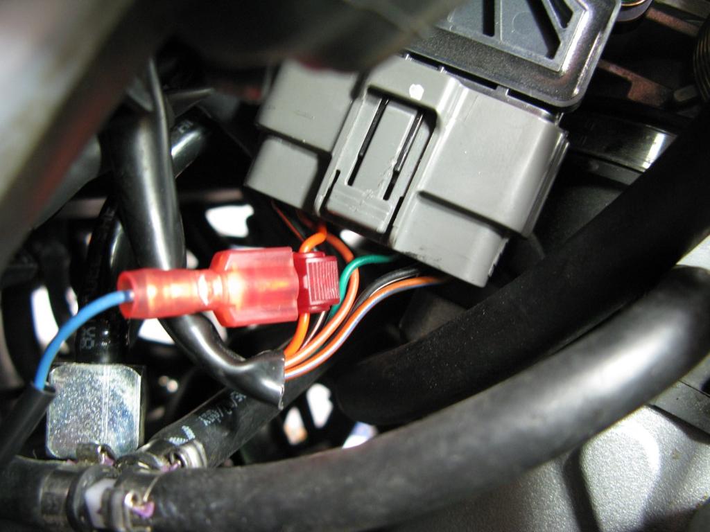 7. Locate the Throttle Position Sensor (TPS) which can be found on the right side of the throttle bodies.