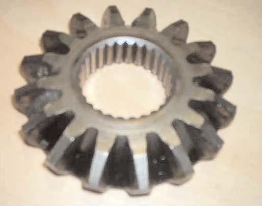same depth as the badly worn At right, one of two large side gears. keep the same dimensions when the job is completed.