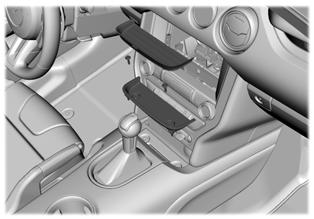Transmission 3. Locate the white release lever and slide the lever forward while pulling the gearshift lever out of the park (P) position and into the neutral (N) position. 4. Reinstall the console.