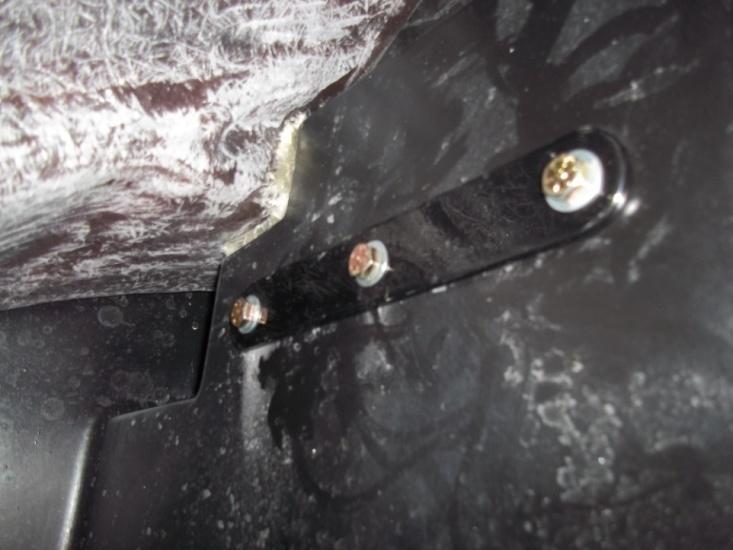 e. Place inner liner back plate inside trunk. Use the 3/8-16x1.5 hex head cap screws w/ washers. Torque to 45 ft-lbs.