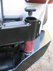 Install rubber bump stop thru the tab on the left side of bumper. Use stainless steel 1/4 cap nut to tighten in place.