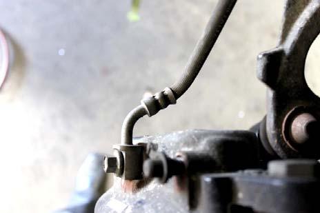 Reinstall brake rotor and tighten retainer bolt, then reinstall brake caliper. 20.
