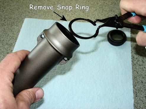 4.3.3. Remove the Snap Ring that holds the Main Seal in Place, and carefully pry