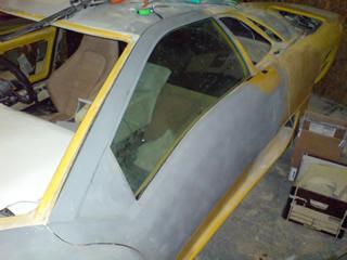 The next step is to re install the door onto the car and make sure the distortion caused by the door fitting into the frame still allows the glass to slide up and down evenly.