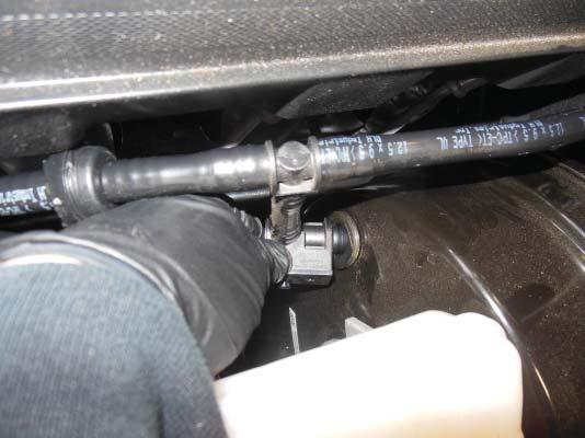 33. Disconnect the brake booster line on from the
