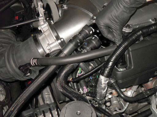 261. Install the PCV line shown to the left side valve cover and the air inlet near the throttle body shown.
