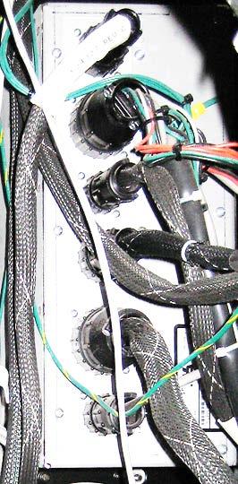 Unplug Shell Harness Cable from P5 Connector Figure 7-9: Removing Shell Harness Cable from P5 Conn. on C-More Rear Panel 3.