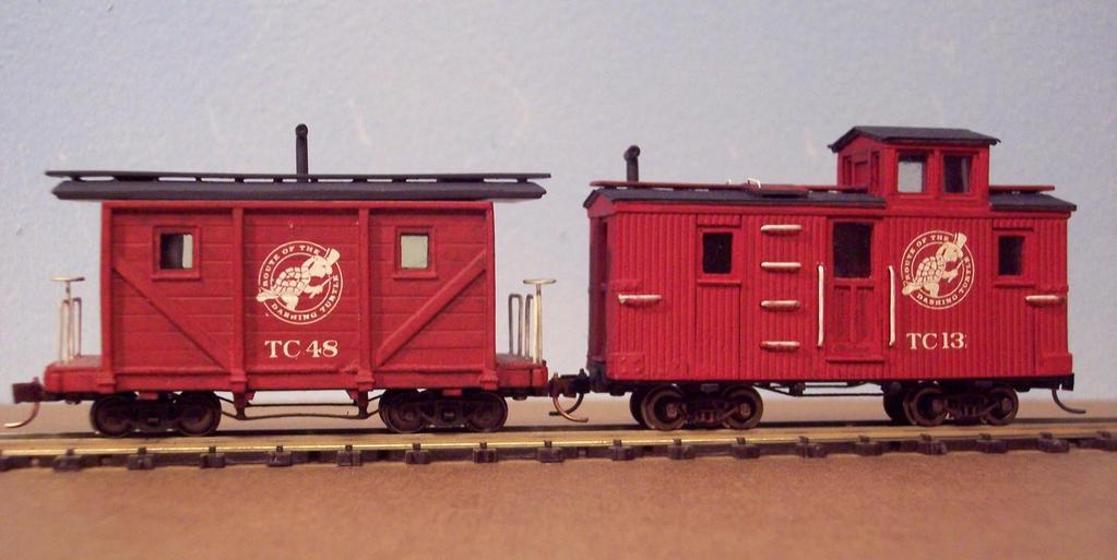 Two HOn30 Short Cabooses Microtrains trucks and couplers added Smoke stacks, brake