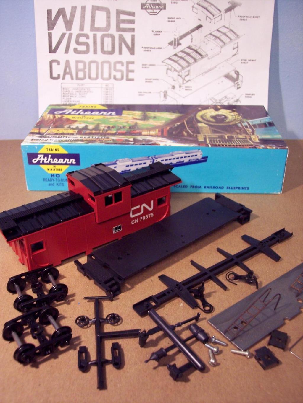 Typical Athearn HO Caboose Kit Body Shell Assembly Floor and Chassis Brake parts Trucks and