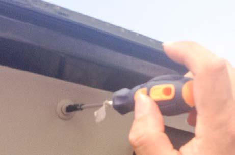 7. Using a screwdriver, carefully remove the plastic trim clip on the lift