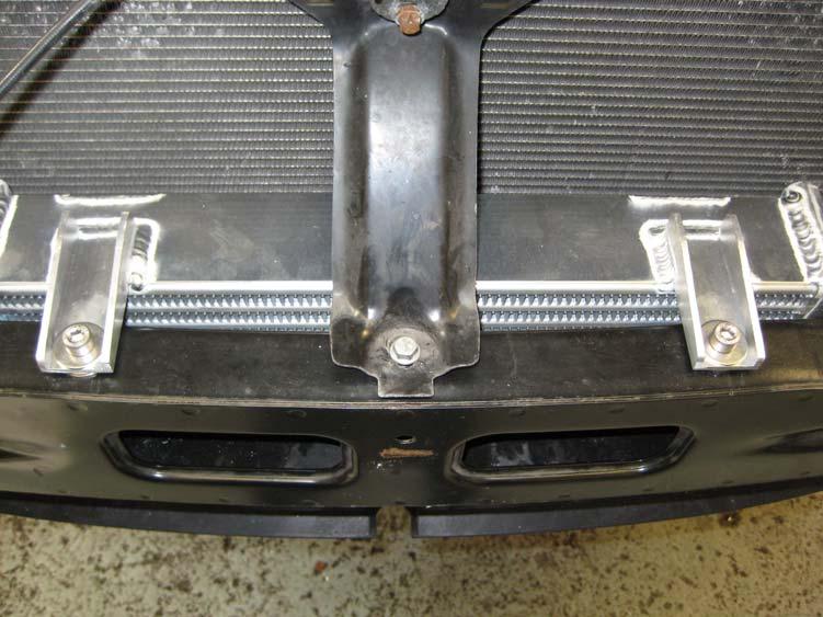 15. Remount the bumper bar to the car, with the intercooler still loosely attached.