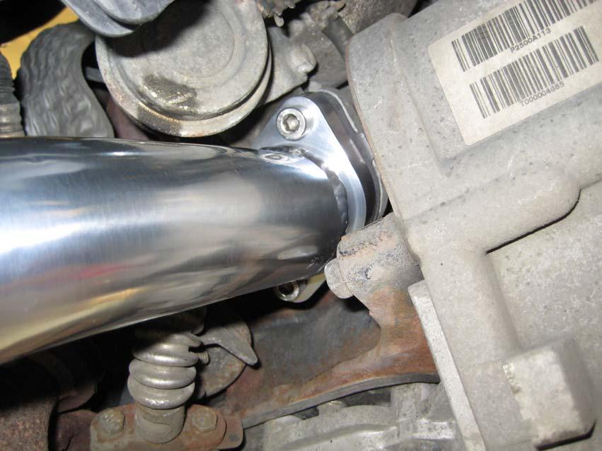 Using two M8x20 allen head bolts and a suitable allen key, bolt the turbo