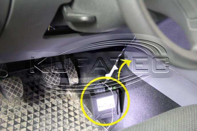 17 Store and fixate the rear-view camera interface behind the plastic cover of the center-console in the