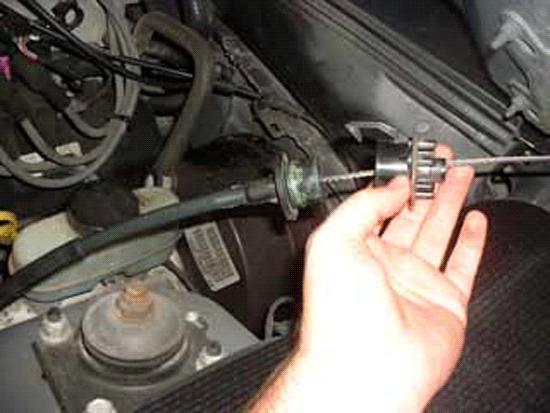 11. After removing the two bolts, pull the clutch cable out from the firewall. Be careful not to crimp the clutch cable unless you plan on replacing it with an adjustable one. 12.