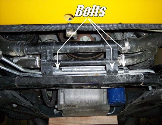 You will notice that the hard transmission lines lay on top of the coolant/transmission line bracket mounts.