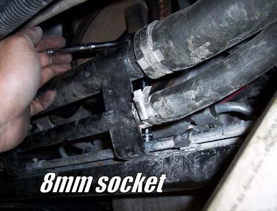 This will allow the bar to pass through between the coolant lines on top and the transmission lines on the bottom.
