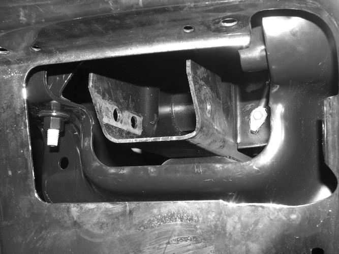 Outer mounting hole in end of frame for tow