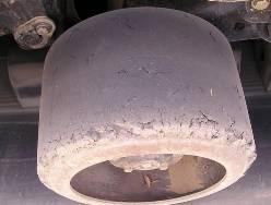 Undercarriage Inspection Midroller Condition A. Check the condition of the midroller seals. Look for any wet areas that indicate a leaking seal. B. Check condition of midroller rubber.