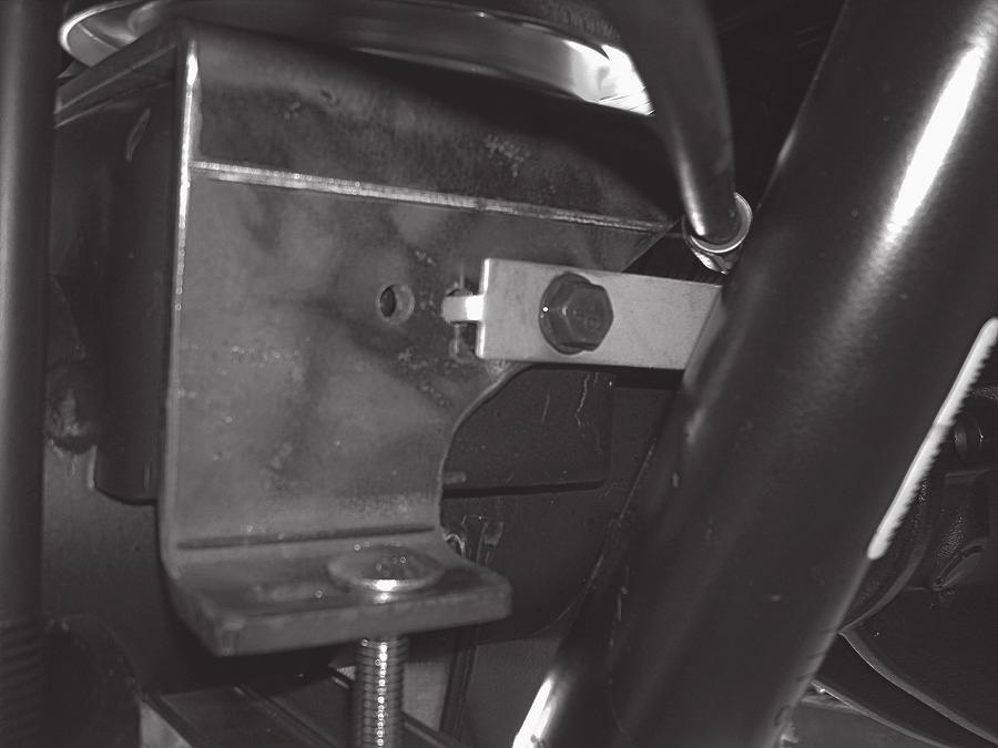 NOTE 2. Insert the lower clamp bar (M) over the two carriage bolts previously installed and cap with two 3/