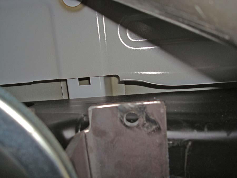 On the passenger side on some models it may be necessary to bend the heat shield slightly for the U-bolt to align properly with the upper bracket fig.