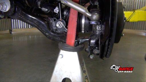 lower control arm to close the gap to 1/2 between the lower ball joint bracket