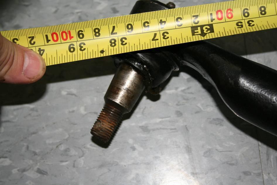 you removed earlier, measure the length from bushing center to the