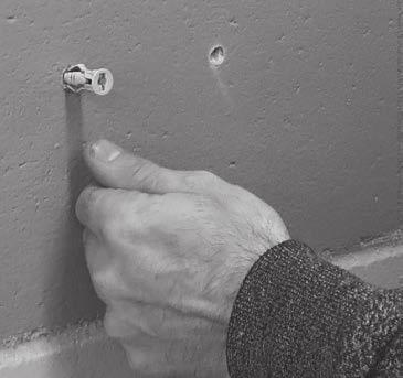 Put hollow wall anchor into holes 3.