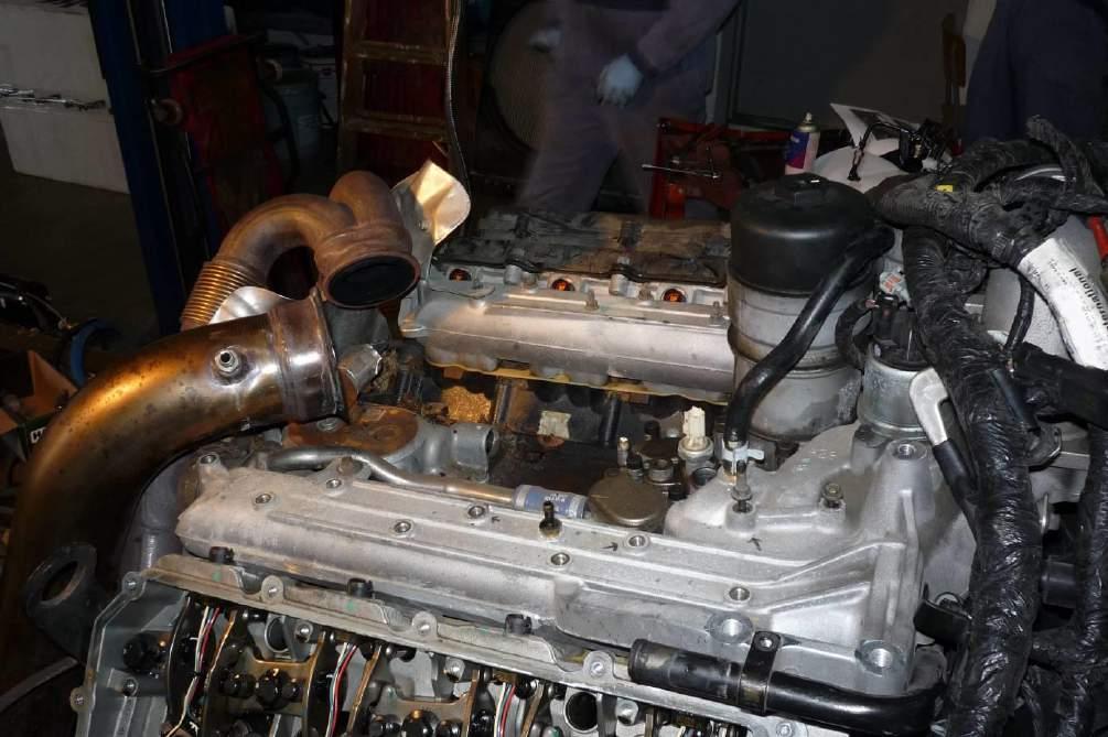 9 2. Reinstall intake manifold. 3. Reinstall the one (1) 10mm bolt securing the fuel line to the front of the intake. 4.
