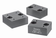 Surface-Mount Layer Surface-Mount Components Surface-mount components, which feature all porting through a single surface, bolt to the top of the substrate-manifold assembly to complete the fluid