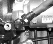 from the HP pump. 4. Disconnect the high and low fuel pressure hoses from the HP pump.