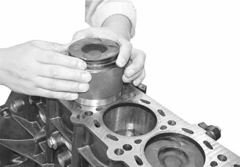 52 01 3) Remove the piston assembly through the
