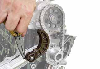 Remove the timing chain guide rail