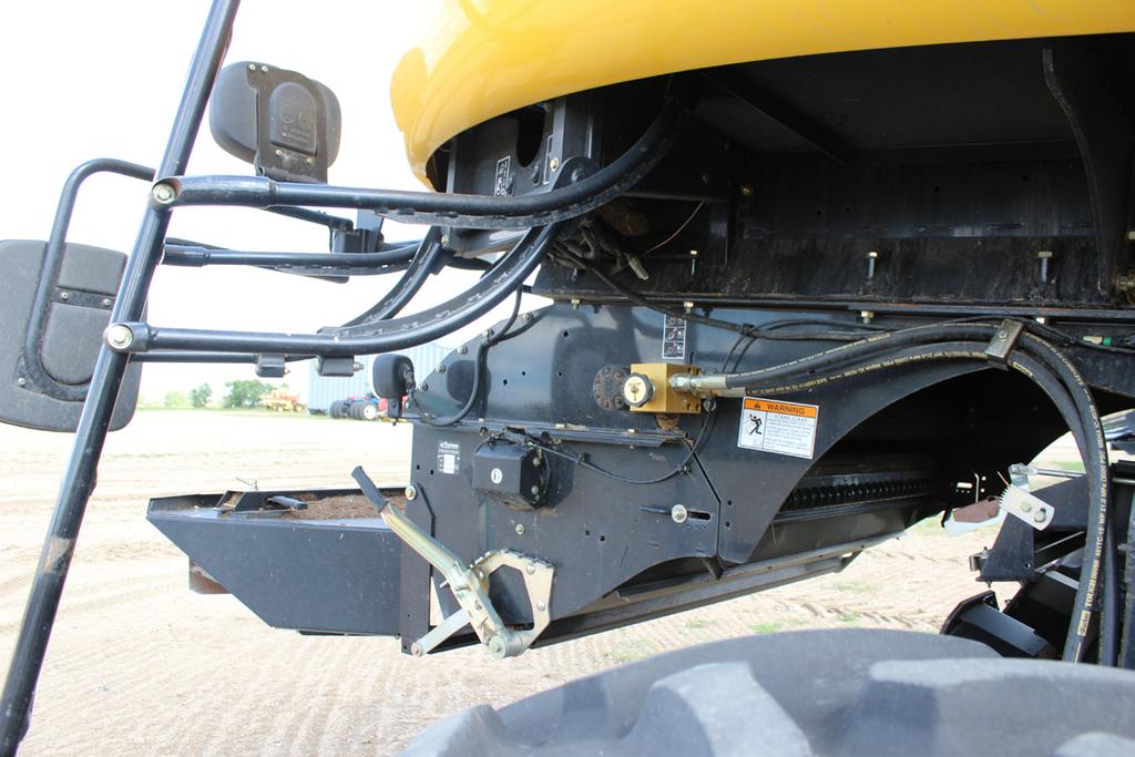 1.4 Remove factory spreader (G). G 1.5 Remove lower factory shield (H) from drive side. H 1.