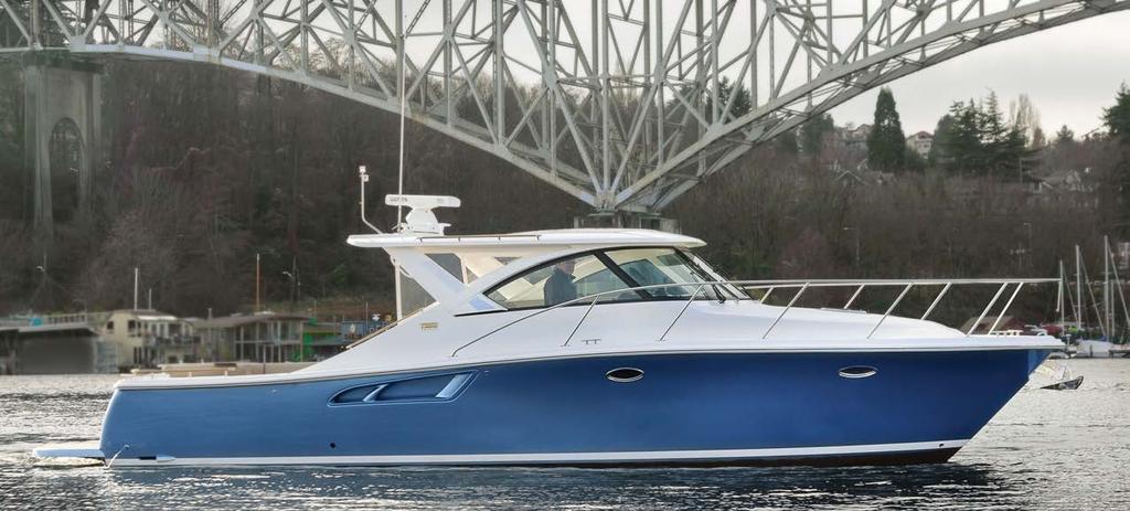 TIARA 36 $695,789 $639,900 45 Swim Platform with Built-In Ladder Concealed Lewmar V1 Anchor Windlass Hardtop with Sunroof and Side Enclosures Tiara Custom Composite Windshield Frame Double Helm Seat