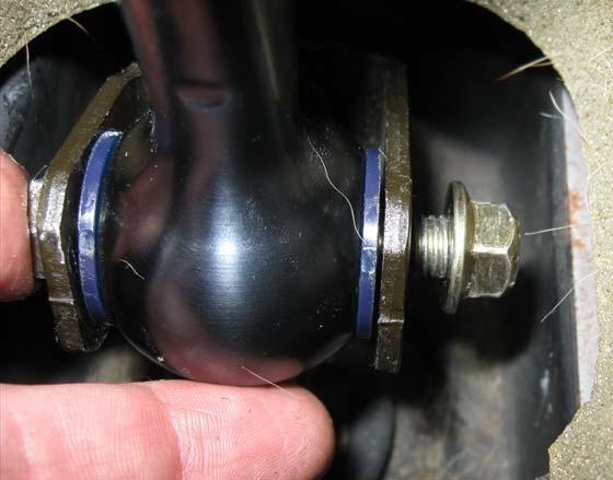 Install the nut on to the threaded end of the bolt and tighten with a 12mm wrench while holding the head of the