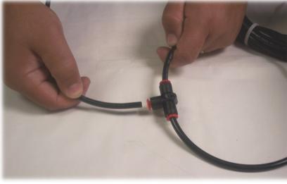 28. Strip ¼ of insulation from both ends of the black wire at the cut and crimp spade connectors on both. 29. Insert both spade connectors on either prong located on the back of the controller switch.