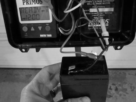 using PRIMOS 6V STEROID Rechargeable Battery (Model 64013). Locate red and black wires extending from the Digital Controller.