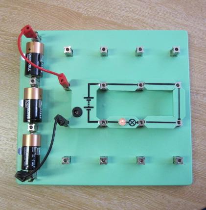 Over to you: Build a circuit that makes a bulb light. Use a 6.0V 0.04A bulb.