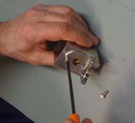 insert the poppet valves ensuring proper